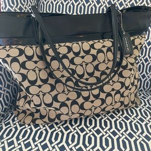 Coach bag briefcase/computer bag measures approx 13” tall and 18” wide